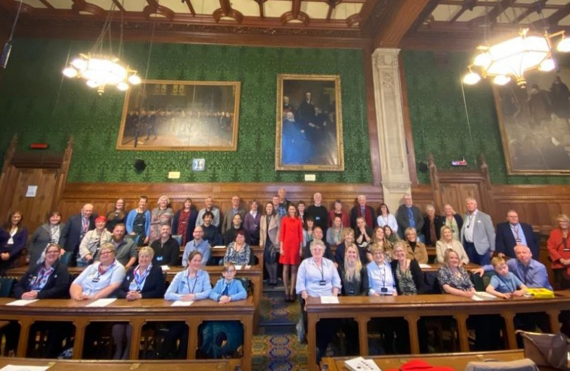 A group photo of the nominees in Committee Room 14